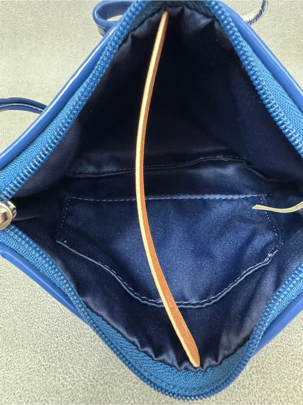 Coach Poppy blue embossed patent leather wristlet